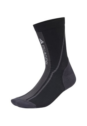 Black athletic sock featuring a ribbed design, reinforced heel, and toe, with gray accents and logo detail on the side.
