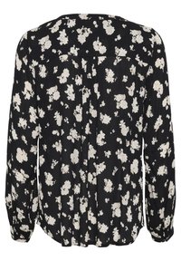 Blusa nera a fiori con maniche lunghe, motivo floreale bianco, texture morbida, polsini con bottoni e design con pieghe sul retro.