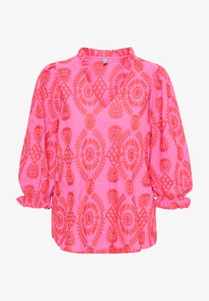 Różowa bluzka z dekoltem w kształcie litery V, bufiastymi rękawami i pomarańczowym haftem kwiatowym w symetrii na całej powierzchni. Wykonana z lekkiej bawełny.