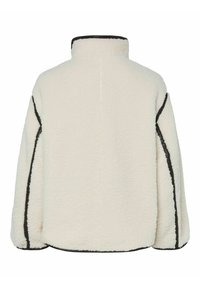 Fleecejakke i off-white med høy krage, svart kant langs sømmene og en avslappet, oversized passform. Teksturert stoff gir varme.