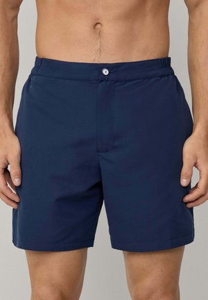 Marineblaue Badeshorts mit geradem Schnitt, elastischem Bund und einer vorderen Knopfleiste. Glatte Textur, leichtes Material, keine Taschen.