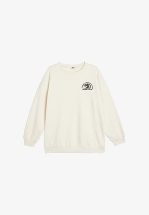 Kermanvärinen collegepaita, joka on valmistettu pehmeästä kankaasta ja jossa on pyöreä kaula-aukko sekä lasketut hartiat. Rinnassa on brodeerattu graafinen kuvasto.