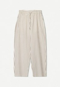 Randiga lätta byxor i krämfärgad och brun, med elastisk midja och dragsko, i en avslappnad och vid passform.