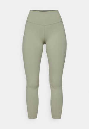 High-waisted, form-fitting leggings in a soft olive green fabric. Smooth texture with reinforced seams and no visible patterns or accents.