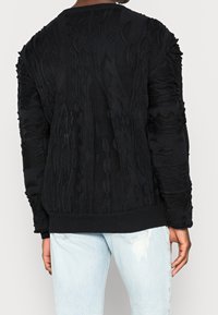 Carlo Colucci Sweter