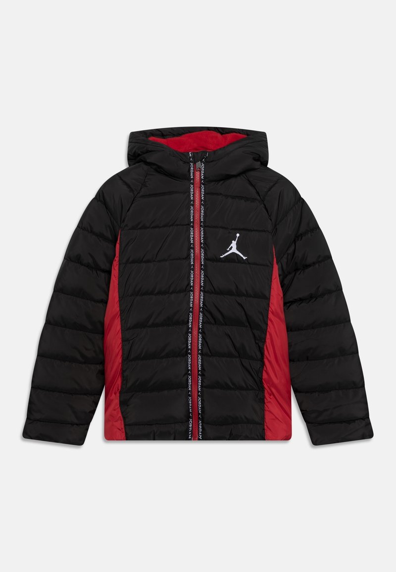 Puffer jacket with a black exterior, red side panels, and a hood. Features a zip front and a white logo on the chest. Textured quilted design.