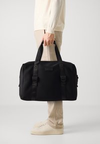 ALDO BRODDIE UNISEX - Sac week-end - black