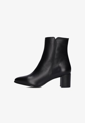 Black leather ankle boot with a pointed toe, smooth texture, and a block heel. Sleek design with a minimalistic silhouette.