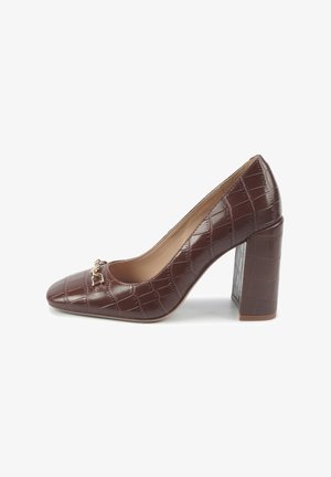 Brown faux crocodile leather pump with a square toe and a block heel. Features a gold-tone accent on the front. Smooth surface texture.