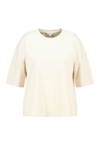 Beige katoenen t-shirt met korte mouwen, ronde hals en een ontspannen, losse pasvorm.