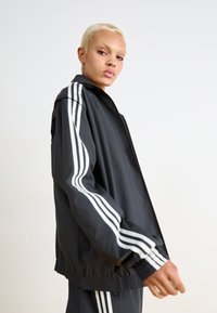 adidas Originals ZIP OFF - Treniņjaka - black