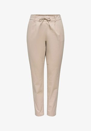 Pantalon beige fuselé avec taille élastique et cordon de serrage, plis devant et poches latérales, présenté sur fond blanc.