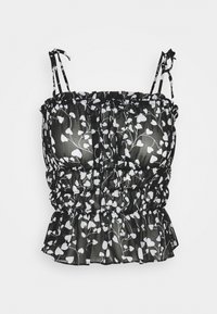 Haut court à imprimé floral noir et blanc avec bretelles réglables, texture froncée et ourlet à volants. Confectionné dans un tissu léger et transparent.