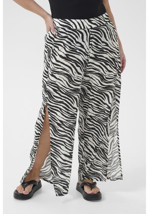 KCCAISY AMI - Trousers - black chalk animal