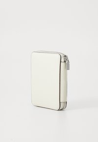 White leather wallet with textured surface, rectangular shape, zip closure, and silver hardware detail. Accented edges in a contrasting color.