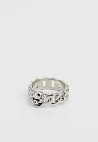 Silver ring featuring a skull design and a chain-link pattern, with polished texture and cutouts along the band.