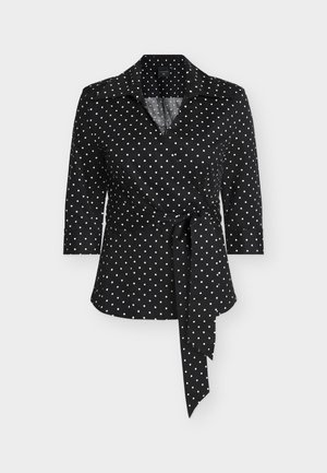 Schwarze Wickelbluse mit weißen Polka-Dots, Kragen, 3/4-Ärmeln und einer gebundenen Taillendetail für eine figurbetonte Silhouette.