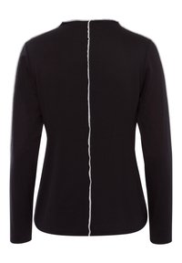 Black long-sleeve top with a round neckline, featuring a central white stitching detail along the back and soft, textured fabric.