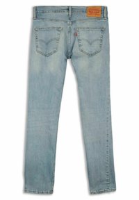 Jeans in denim blu chiaro con taglio dritto, dotati di una patella in pelle in vita, due tasche posteriori e aree scolorite per texture.