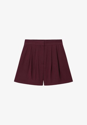 Shorts bordeaux taille haute avec plis à l’avant, fermeture frontale invisible et ceinture ajustée.