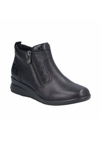 Bottines en cuir noir avec une tige lisse, fermeture éclair sur le côté et accent texturé noir au talon. Semelle en caoutchouc légèrement surélevée pour le confort.