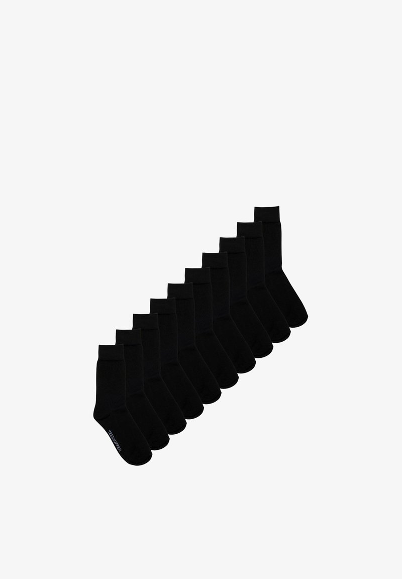 Dix paires de chaussettes noires unies, de longueur mi-mollet, disposées en diagonale sur un fond blanc.