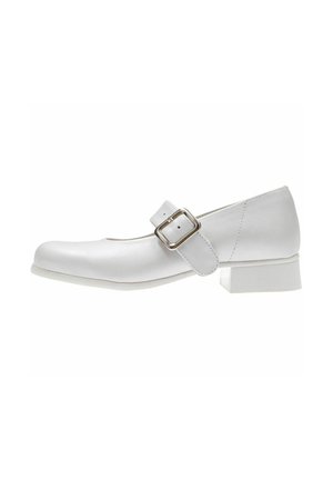 White leather Mary Jane shoe with a square silver buckle and a low block heel on a plain white background.