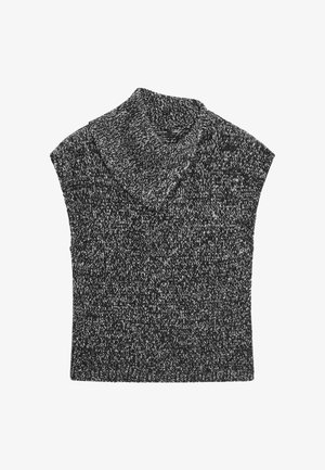 Stickad svartvit ärmlös tröja med hög krage, med ett strukturerat mönster och en avslappnad passform.