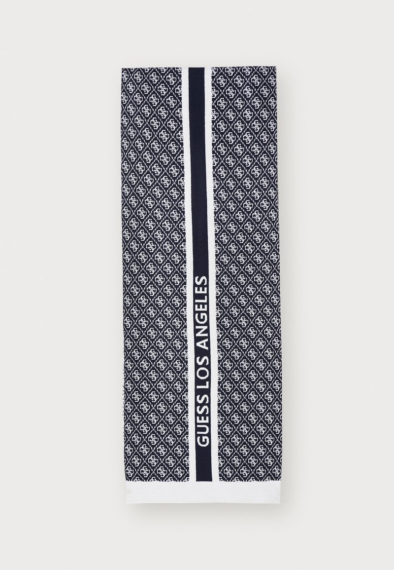 Dunkeltürkis Handtuch mit einem Rautenmuster, ausgestattet mit einem weißen Akzentband, das "GUESS LOS ANGELES" liest. Aus Baumwollmaterial mit einer strukturierten Oberfläche.