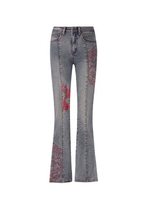 Flared jeans in faded blue denim with red embroidered floral and abstract patterns on outer legs. Standard five-pocket design and belt loops.