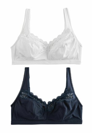 Dve bezdrôtové podprsenky s čipkou, jedna biela a jedna tmavomodrá, s nastaviteľnými ramienkami a jemnou bodkovanou textúrou.