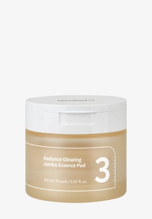Container van Radiance Glowing Jumbo Essence Pads, beige lichaam met witte deksel, 150 ml, 70 pads, gelabeld met nummer 3 aan de voorkant.