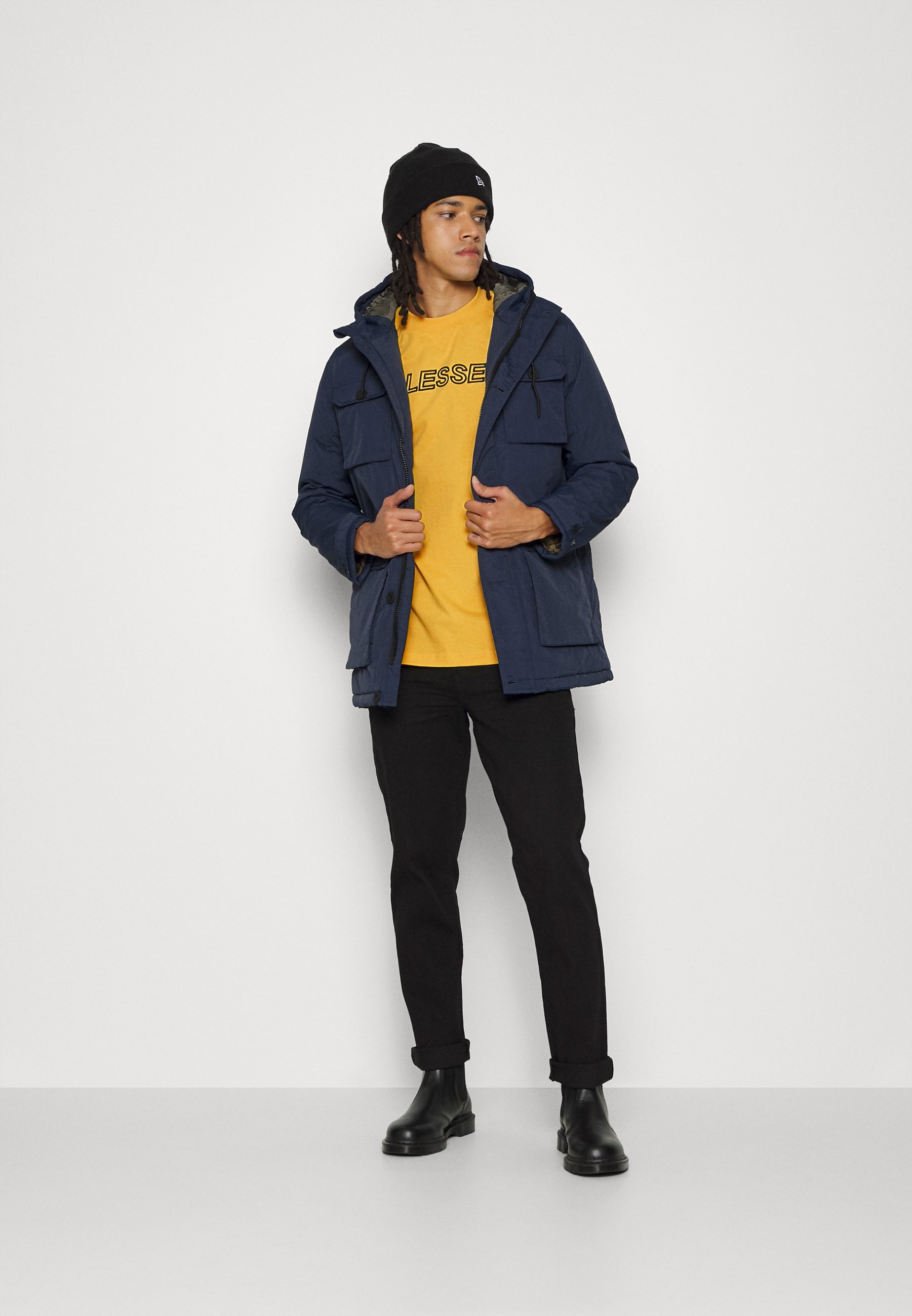 Puma TEE - Camiseta estampada - mimosa/amarillo - Zalando.es