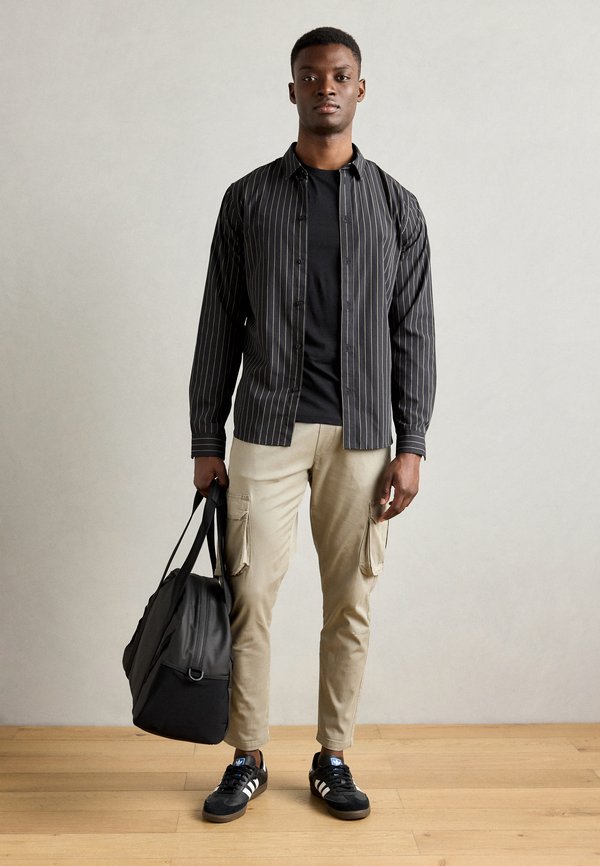 OVERDYED PANTS - Cargo trousers - khaki3