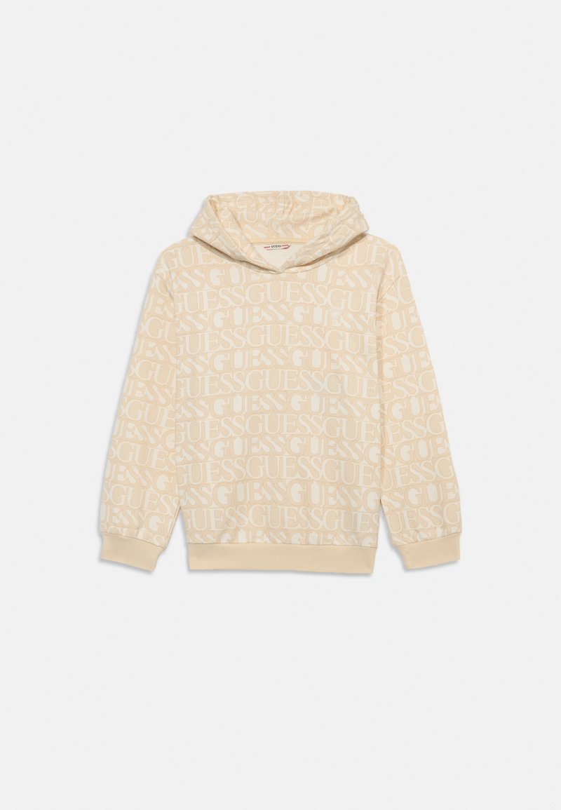 Beige hoodie with an all-over white "GUESS" logo pattern. Features a drawstring hood and ribbed cuffs and hem. Soft, textured fabric.