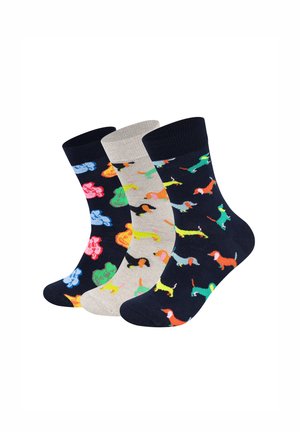 Set van drie paar sokken met een marineblauwe achtergrond met kleurrijke teckels, een grijze achtergrond met kleurige honden en een donkere achtergrond met bloemen.