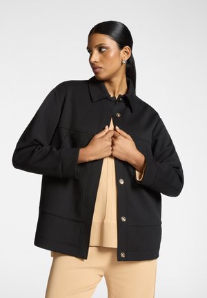 Felpa con zip - black