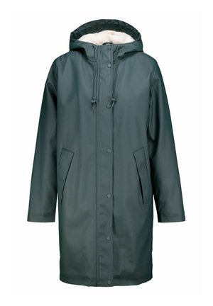 Parka verte imperméable avec capuche, doublure en fourrure, fermeture à boutons et deux poches latérales. Dispose de cordons de serrage au col et aux poignets.