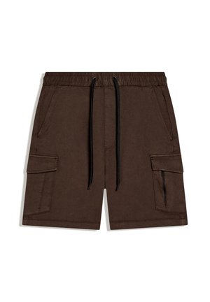 Hnedé cargo šortky s elastickým pásom, čiernymi šnúrkami, bočnými vreckami s chlopňou a vreckom so zipsom na pravej nohe.