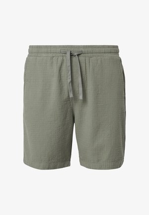 Šviesiai žali nerkami šortai su elastinga juostele, reguliuojamu raišteliu ir tekstūruotu paviršiumi. Tiesių kojų dizainas, be kišenių.