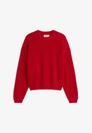 Red knitted sweater with a round neckline, ribbed texture, and long sleeves. Features a relaxed fit and a cropped hem. Tags visible inside.