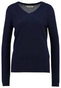Pull bleu marine à col en V en tissu en maille douce ; doté de manches longues et d'un ourlet côtelé pour un look ajusté.
