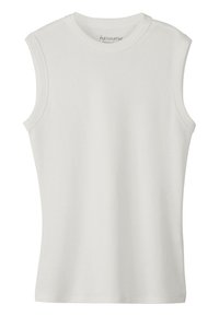 Vit ärmlös bomullstopp med rund halsringning och ren, enkel design. Slät textur utan mönster eller detaljer.