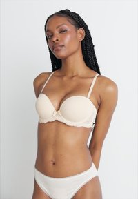 DORINA BLAIR - Krūtinę pakelianti liemenėlė - nude