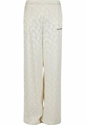 Krēmkrāsas platā gurna bikses ar maigu paisley rakstu un logotipa detaļām. Izgatavotas no mīksta auduma, nodrošinot brīvu piegriezumu un gludu tekstūru.