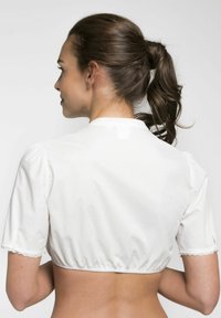 White short-sleeved blouse featuring a rounded neckline, gathered waist, and delicate lace trim on the sleeves, shown from the back.