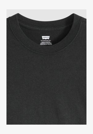 Czarny bawełniany t-shirt z okrągłym dekoltem z prążkowanym wykończeniem, z metką wewnątrz zawierającą informacje o marce i pielęgnacji. Gładka faktura.