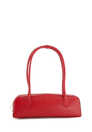 Red leather handbag with a rectangular shape, two long handles, a top zip closure, and smooth texture. Features a brand logo on the side.