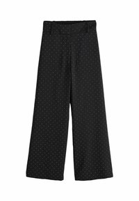 Wide-leg trousers in black fabric featuring a polka dot pattern in white. Elastic waistband and smooth texture. No visible hardware details.