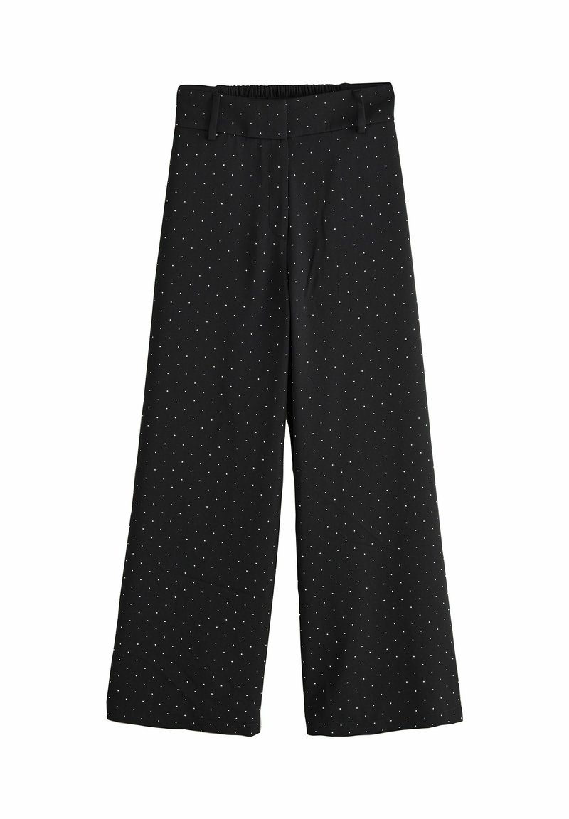 Wide-leg trousers in black fabric featuring a polka dot pattern in white. Elastic waistband and smooth texture. No visible hardware details.